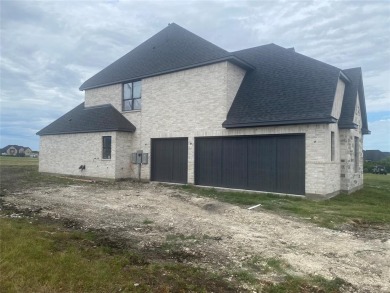 The luxurious details and functional layout of this new on The Bridges Golf Club in Texas - for sale on GolfHomes.com, golf home, golf lot