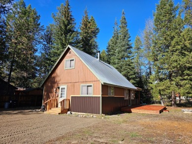 Cute as a button cabin in a great in town location! This 3 on McCall Municipal Golf Course in Idaho - for sale on GolfHomes.com, golf home, golf lot