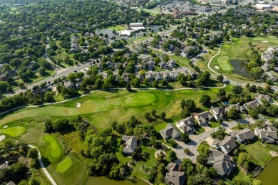 The epitome of low-maintenance luxury, this thoughtfully on Tallgrass Country Club in Kansas - for sale on GolfHomes.com, golf home, golf lot