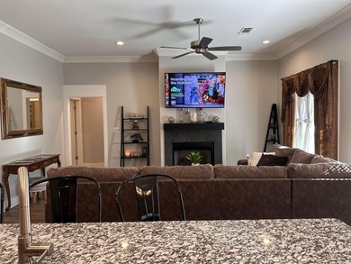 This house located in the Mystic Creek Golf Club area packs a on Mystic Creek Golf Club in Arkansas - for sale on GolfHomes.com, golf home, golf lot