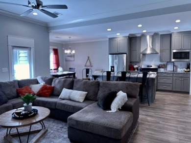 This house located in the Mystic Creek Golf Club area packs a on Mystic Creek Golf Club in Arkansas - for sale on GolfHomes.com, golf home, golf lot