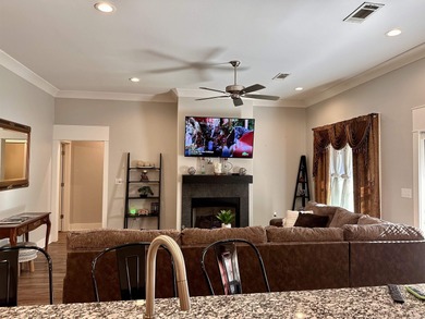 This house located in the Mystic Creek Golf Club area packs a on Mystic Creek Golf Club in Arkansas - for sale on GolfHomes.com, golf home, golf lot