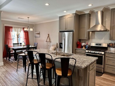 This house located in the Mystic Creek Golf Club area packs a on Mystic Creek Golf Club in Arkansas - for sale on GolfHomes.com, golf home, golf lot