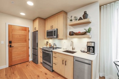 Village-facing end unit in the heart of Tamarack! This spacious on Osprey Meadows at Tamarack Resort in Idaho - for sale on GolfHomes.com, golf home, golf lot