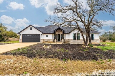 Welcome to this stunning fully-furnished residence nestled in on Vaaler Creek Golf Club in Texas - for sale on GolfHomes.com, golf home, golf lot