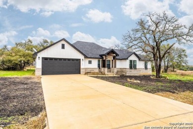 Welcome to this stunning fully-furnished residence nestled in on Vaaler Creek Golf Club in Texas - for sale on GolfHomes.com, golf home, golf lot