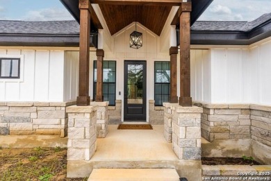 Welcome to this stunning fully-furnished residence nestled in on Vaaler Creek Golf Club in Texas - for sale on GolfHomes.com, golf home, golf lot