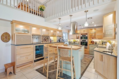 This beautifully renovated townhome in The Estuary at Jupiter on Jupiter Dunes Golf Course in Florida - for sale on GolfHomes.com, golf home, golf lot