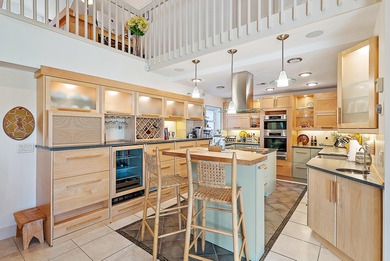 This beautifully renovated townhome in The Estuary at Jupiter on Jupiter Dunes Golf Course in Florida - for sale on GolfHomes.com, golf home, golf lot