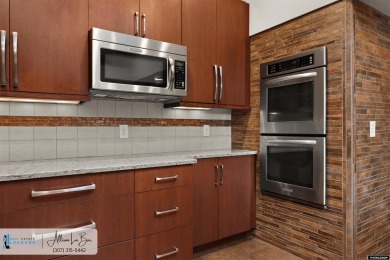 Step into complete paradise with this contemporary ranch style on Paradise Valley Country Club in Wyoming - for sale on GolfHomes.com, golf home, golf lot