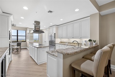 Enjoy elegant waterfront living in Palmas Del Sol, a luxury on Gulf Harbour Yacht and Country Club in Florida - for sale on GolfHomes.com, golf home, golf lot