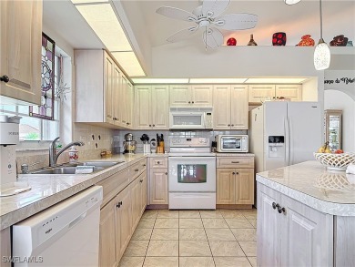 Welcome to this customized Riviera model home in HERONS GLEN on Herons Glen Golf and Country Club in Florida - for sale on GolfHomes.com, golf home, golf lot