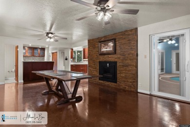 Step into complete paradise with this contemporary ranch style on Paradise Valley Country Club in Wyoming - for sale on GolfHomes.com, golf home, golf lot