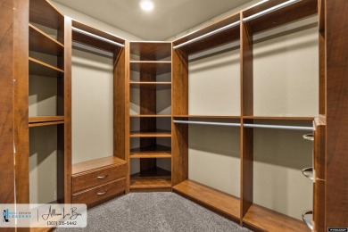 Step into complete paradise with this contemporary ranch style on Paradise Valley Country Club in Wyoming - for sale on GolfHomes.com, golf home, golf lot
