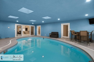 Step into complete paradise with this contemporary ranch style on Paradise Valley Country Club in Wyoming - for sale on GolfHomes.com, golf home, golf lot