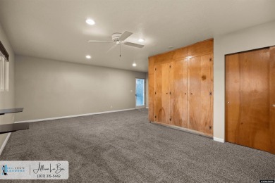 Step into complete paradise with this contemporary ranch style on Paradise Valley Country Club in Wyoming - for sale on GolfHomes.com, golf home, golf lot