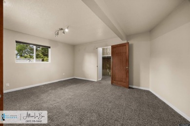 Step into complete paradise with this contemporary ranch style on Paradise Valley Country Club in Wyoming - for sale on GolfHomes.com, golf home, golf lot