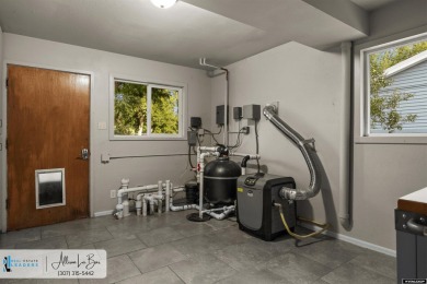 Step into complete paradise with this contemporary ranch style on Paradise Valley Country Club in Wyoming - for sale on GolfHomes.com, golf home, golf lot