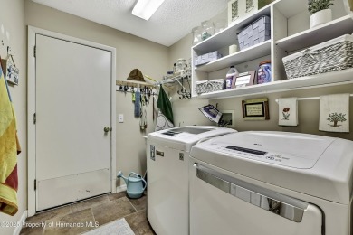 Welcome to this beautifully maintained 3-bedroom, 2-bathroom on Timber Pines Golf Course in Florida - for sale on GolfHomes.com, golf home, golf lot