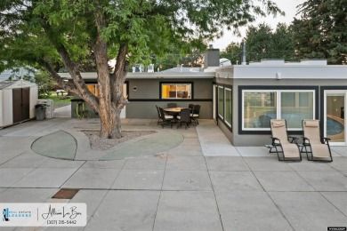 Step into complete paradise with this contemporary ranch style on Paradise Valley Country Club in Wyoming - for sale on GolfHomes.com, golf home, golf lot