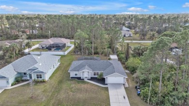 This meticulously maintained pool home is set on a spacious on Bobcat Trail Golf Club in Florida - for sale on GolfHomes.com, golf home, golf lot