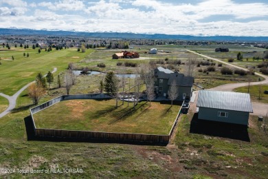 Unparalleled quality and beauty starting with the copper roof on Rendezvous Meadows Golf in Wyoming - for sale on GolfHomes.com, golf home, golf lot