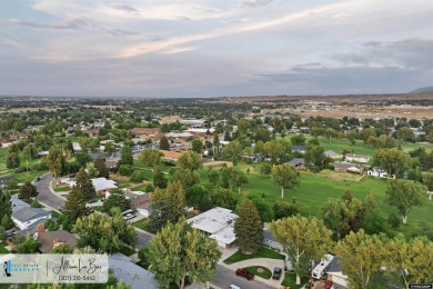 Step into complete paradise with this contemporary ranch style on Paradise Valley Country Club in Wyoming - for sale on GolfHomes.com, golf home, golf lot