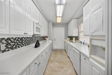 Enjoy elegant waterfront living in Palmas Del Sol, a luxury on Gulf Harbour Yacht and Country Club in Florida - for sale on GolfHomes.com, golf home, golf lot