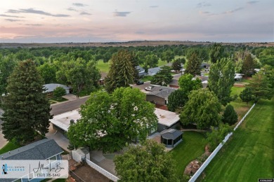 Step into complete paradise with this contemporary ranch style on Paradise Valley Country Club in Wyoming - for sale on GolfHomes.com, golf home, golf lot