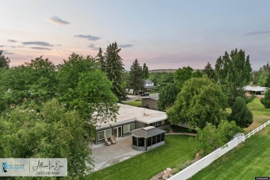 Step into complete paradise with this contemporary ranch style on Paradise Valley Country Club in Wyoming - for sale on GolfHomes.com, golf home, golf lot