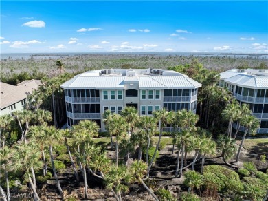 Experience coastal elegance at this Heron at the Sanctuary Condo on The Sanctuary Golf Club in Florida - for sale on GolfHomes.com, golf home, golf lot