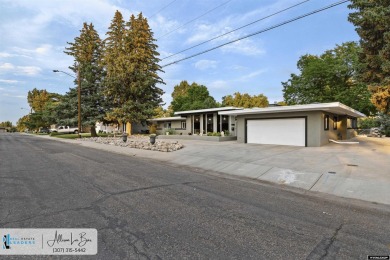 Step into complete paradise with this contemporary ranch style on Paradise Valley Country Club in Wyoming - for sale on GolfHomes.com, golf home, golf lot