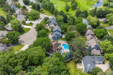 Nestled in a private cul-de-sac across from Prestwick Golf Club on Prestwick Golf Club At Wedgewood in Minnesota - for sale on GolfHomes.com, golf home, golf lot
