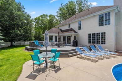 Nestled in a private cul-de-sac across from Prestwick Golf Club on Prestwick Golf Club At Wedgewood in Minnesota - for sale on GolfHomes.com, golf home, golf lot