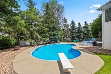 Nestled in a private cul-de-sac across from Prestwick Golf Club on Prestwick Golf Club At Wedgewood in Minnesota - for sale on GolfHomes.com, golf home, golf lot