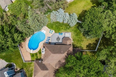 Nestled in a private cul-de-sac across from Prestwick Golf Club on Prestwick Golf Club At Wedgewood in Minnesota - for sale on GolfHomes.com, golf home, golf lot