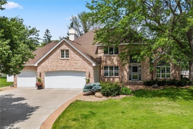 Nestled in a private cul-de-sac across from Prestwick Golf Club on Prestwick Golf Club At Wedgewood in Minnesota - for sale on GolfHomes.com, golf home, golf lot