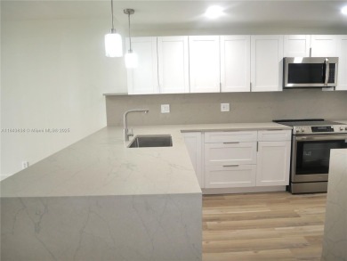 Beautifully updated 2-bedroom, 2-bath condo in the desirable on Palm-Aire Country Club and Resort - Palms in Florida - for sale on GolfHomes.com, golf home, golf lot
