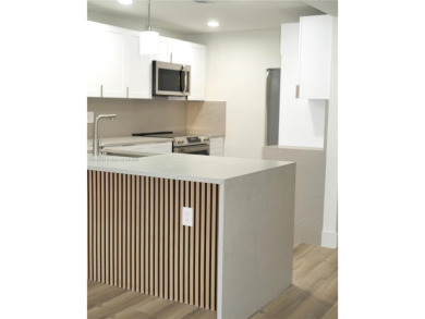 Beautifully updated 2-bedroom, 2-bath condo in the desirable on Palm-Aire Country Club and Resort - Palms in Florida - for sale on GolfHomes.com, golf home, golf lot