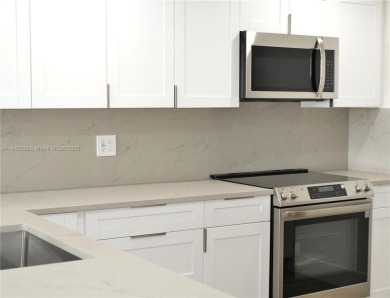 Beautifully updated 2-bedroom, 2-bath condo in the desirable on Palm-Aire Country Club and Resort - Palms in Florida - for sale on GolfHomes.com, golf home, golf lot