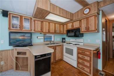 Located in Fountain View RV Resort, a 55+ community where you on Del Tura Golf and Country Club in Florida - for sale on GolfHomes.com, golf home, golf lot
