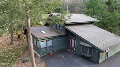 ON THE GREEN! Your dream golf course home in Paupack Hills on Paupack Hills Golf and Country Club in Pennsylvania - for sale on GolfHomes.com, golf home, golf lot