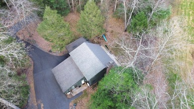 ON THE GREEN! Your dream golf course home in Paupack Hills on Paupack Hills Golf and Country Club in Pennsylvania - for sale on GolfHomes.com, golf home, golf lot