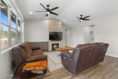 Welcome to this beautifully crafted 3-bedroom, 2.5-bath home on Elephant Rocks at Williams in Arizona - for sale on GolfHomes.com, golf home, golf lot