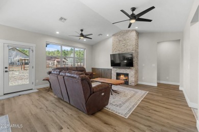 Welcome to this beautifully crafted 3-bedroom, 2.5-bath home on Elephant Rocks at Williams in Arizona - for sale on GolfHomes.com, golf home, golf lot