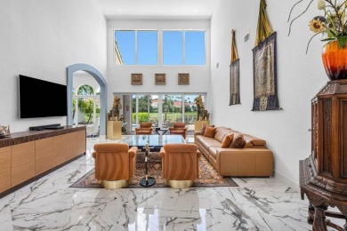 Soaring two-story ceiling heights greet you upon entering this on Polo Club of Boca Raton in Florida - for sale on GolfHomes.com, golf home, golf lot