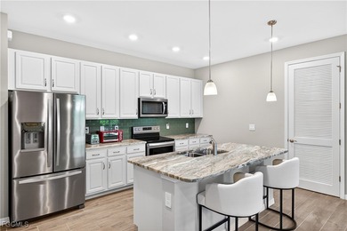 This 2022 POOL HOME offers an unbeatable combination of on Myerlee Country Club in Florida - for sale on GolfHomes.com, golf home, golf lot