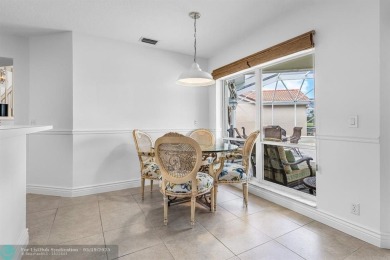 With serene views of the water and golf course, a 2021 roof, and on The Boca Country Club in Florida - for sale on GolfHomes.com, golf home, golf lot