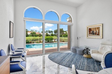 Soaring two-story ceiling heights greet you upon entering this on Polo Club of Boca Raton in Florida - for sale on GolfHomes.com, golf home, golf lot