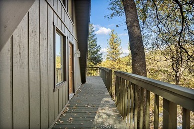 Step into this beautiful remodeled A frame cabin-a timeless on Lake Arrowhead Country Club in California - for sale on GolfHomes.com, golf home, golf lot